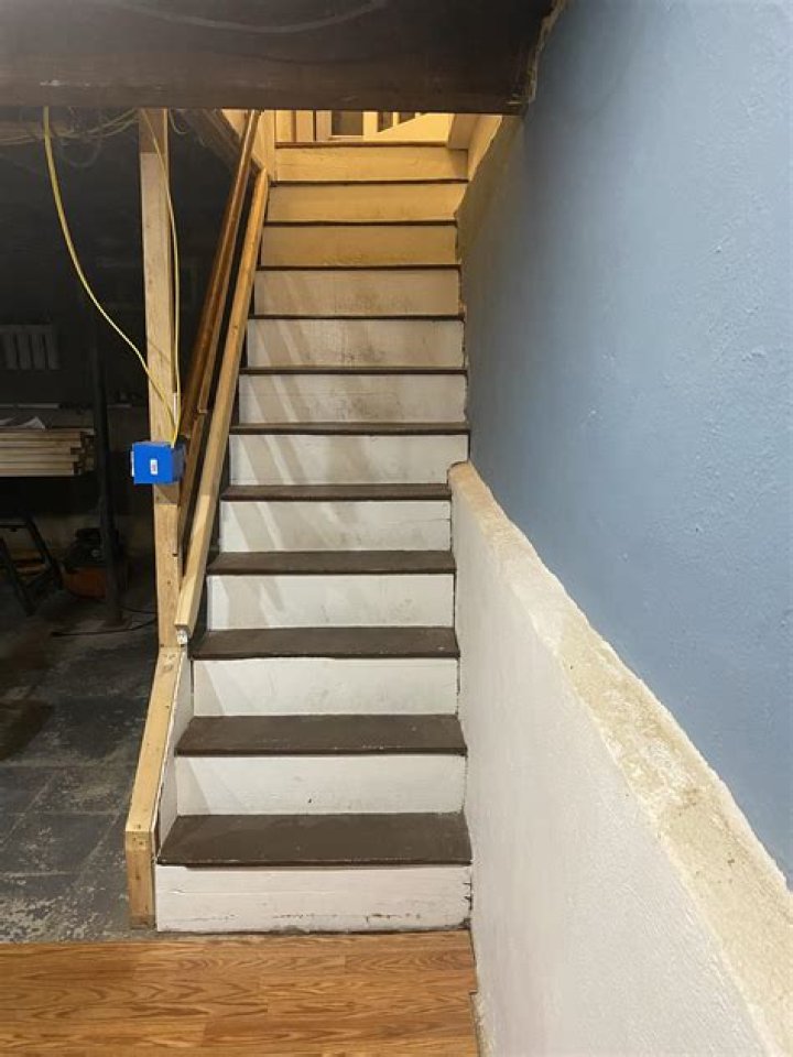 How do you finish concrete basement stairs?