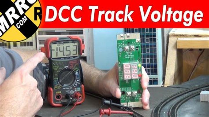 How is DCC track voltage measured?